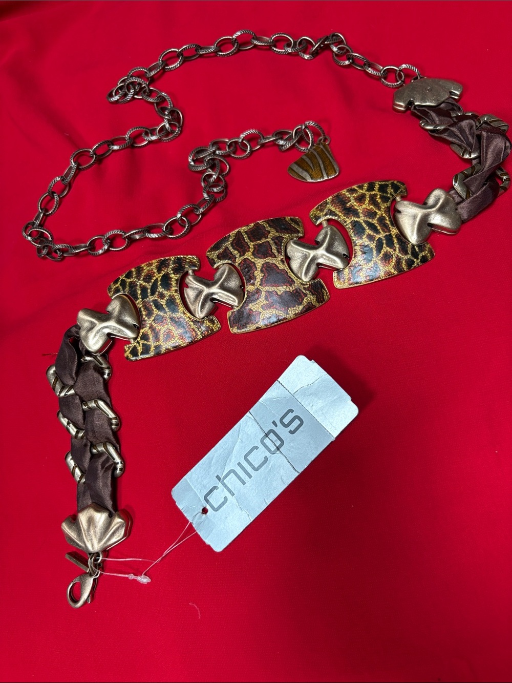 Chico’s M/L giraffe printed metal belt. NWT!!